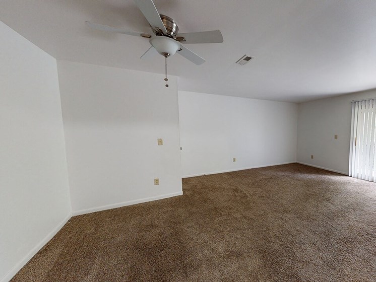 living room with ceiling fan